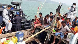 Navy officials said there were 56 people in the boat, mostly children and women.(AP) Navy officials said there were 56 people in the boat, mostly children and women.(AP)
