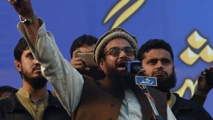 Founder of Lashkar-e-Taiba Hafiz Saeed (centre) launched the Milli Muslim League (MML) in 2017 and has said that it will fight the elections in 2018.(AFP File Photo) Founder of Lashkar-e-Taiba Hafiz Saeed (centre) launched the Milli Muslim League (MML) in 2017 and has said that it will fight the elections in 2018.(AFP File Photo)