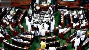 Opposition members protest during the ongoing budget session of Parliament in Lok Sabha in New Delhi on Wednesday.(PTI Photo)