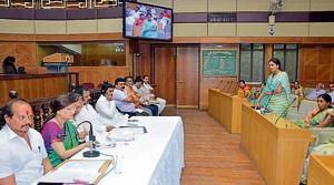 Mayor Mukta Tilak leads the panel of gram panchayat and PMC officials taking questions from the representatives of 11 villages merged within PMC limits.(HT PHOTO) Mayor Mukta Tilak leads the panel of gram panchayat and PMC officials taking questions from the representatives of 11 villages merged within PMC limits.(HT PHOTO)