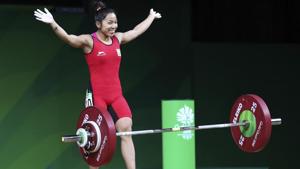 Mirabai Chanu celebrates after making a new Commonwealth Games record in snatch in women's 48kg Weightlifting at the Commonwealth Games in Gold Coast, Australia, Thursday, April 5, 2018.(AP) Mirabai Chanu celebrates after making a new Commonwealth Games record in snatch in women's 48kg Weightlifting at the Commonwealth Games in Gold Coast, Australia, Thursday, April 5, 2018.(AP)