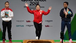 Gold medallist Indian weightlifter Mirabai Chanu during the medal ceremony of women's 48kg event during the 2018 Commonwealth Games in Gold Coast on Thursday.(PTI) Gold medallist Indian weightlifter Mirabai Chanu during the medal ceremony of women's 48kg event during the 2018 Commonwealth Games in Gold Coast on Thursday.(PTI)