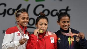 Mirabai Chanu (48kg) smashed snatch, clean and jerk and the overall Games records today to claim India’s first gold in the 2018 Commonwealth Games.(PTI) Mirabai Chanu (48kg) smashed snatch, clean and jerk and the overall Games records today to claim India’s first gold in the 2018 Commonwealth Games.(PTI)