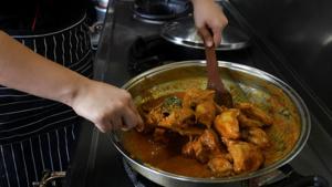 A chef cooks a pot of chicken rendang at a restaurant in Cyberjaya, Selangor, Malaysia.(Reuters) A chef cooks a pot of chicken rendang at a restaurant in Cyberjaya, Selangor, Malaysia.(Reuters)