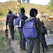 CPI Maoists platoon crossing a field in Jharkhand-Chhatisgarh border.(HT Photo) CPI Maoists platoon crossing a field in Jharkhand-Chhatisgarh border.(HT Photo)