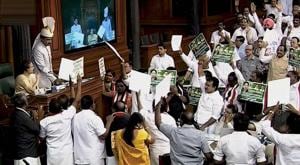 AIADMK members protest in the Well of the Lok Sabha on Thursday.(PTI)