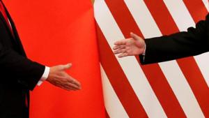 US President Donald Trump and China's President Xi Jinping shake hands after making joint statements at the Great Hall of the People in Beijing.(Reuters file photo) US President Donald Trump and China's President Xi Jinping shake hands after making joint statements at the Great Hall of the People in Beijing.(Reuters file photo)