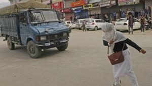 A college student throws a stone at a police vehicle during clashes outside a college over the recent killings in Kashmir, in Srinagar, on Thursday.(Waseem Andrabi/ HT Photo) A college student throws a stone at a police vehicle during clashes outside a college over the recent killings in Kashmir, in Srinagar, on Thursday.(Waseem Andrabi/ HT Photo)