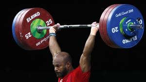 Sathish Kumar Sivalingam of India lifts his way to gold in the 77kg weightlifting final at the 2018 Commonwealth Games (CWG 2018) in Gold Coast.(REUTERS) Sathish Kumar Sivalingam of India lifts his way to gold in the 77kg weightlifting final at the 2018 Commonwealth Games (CWG 2018) in Gold Coast.(REUTERS)