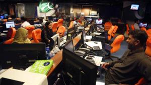 Staff of Pakistani channel Geo News work in their control room in Karachi.(AP) Staff of Pakistani channel Geo News work in their control room in Karachi.(AP)