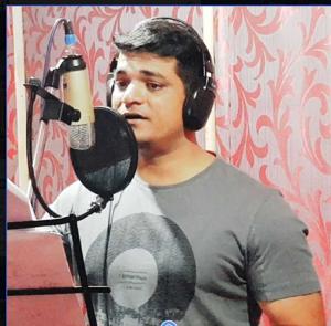 Additional superintendent of police Maheswar Nag (pictured) recorded three of the songs in Halbi and Chhattisgarhiya dialects.(HT Photo) Additional superintendent of police Maheswar Nag (pictured) recorded three of the songs in Halbi and Chhattisgarhiya dialects.(HT Photo)