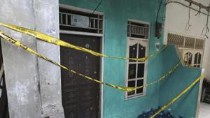 Police tape covers a home-based alcohol factory in Jakarta, Indonesia, Monday.(AP File Photo) Police tape covers a home-based alcohol factory in Jakarta, Indonesia, Monday.(AP File Photo)