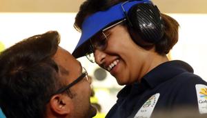 Heena Sidhu celebrates the Commonwealth Games 2018 (CWG 2018) gold medal with her coach and husband Ronak Pandit at the Belmont Shooting Centre in Gold Coast on Tuesday.(REUTERS) Heena Sidhu celebrates the Commonwealth Games 2018 (CWG 2018) gold medal with her coach and husband Ronak Pandit at the Belmont Shooting Centre in Gold Coast on Tuesday.(REUTERS)