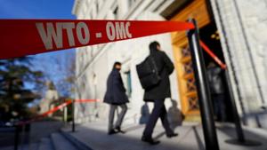 Delegates arrive at the World Trade Organization (WTO) headquarters in Geneva, Switzerland.(Reuters File Photo)