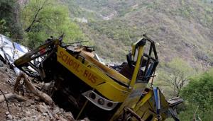 Indian villagers look at a wrecked school bus near Nurpur in Kangra district, Himachal Pradesh, April 10, 2018(AFP) Indian villagers look at a wrecked school bus near Nurpur in Kangra district, Himachal Pradesh, April 10, 2018(AFP)