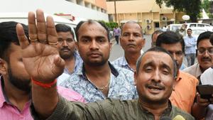 BJP MLA from Unnao Kuldip Singh Sengar speaks to the media outside Chief Minister's office in Lucknow on Monday. He is an accused in the Unnao rape case.(PTI) BJP MLA from Unnao Kuldip Singh Sengar speaks to the media outside Chief Minister's office in Lucknow on Monday. He is an accused in the Unnao rape case.(PTI)