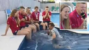 Players burst into fits of laughter as BBC reporter falls into the pool while interviewing then on live television(Twitter/Screengrab)