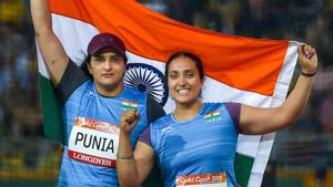 Silver medalist Seema Punia and bronze medalist Navjeet Dhillon of India celebrate their win in the women's discus throw final match at the Commonwealth Games 2018 in Gold Coast, on Thursday.(PTI) Silver medalist Seema Punia and bronze medalist Navjeet Dhillon of India celebrate their win in the women's discus throw final match at the Commonwealth Games 2018 in Gold Coast, on Thursday.(PTI)