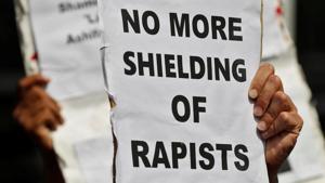 People hold placards to protest the rape and murder of an eight-year-old girl in Kathua (Jammu) and the rape of an Unnao teenager in Uttar Pradesh, in New Delhi on April 12, 2018.(Reuters) People hold placards to protest the rape and murder of an eight-year-old girl in Kathua (Jammu) and the rape of an Unnao teenager in Uttar Pradesh, in New Delhi on April 12, 2018.(Reuters)