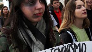 A woman wearing make-up holds a sign that reads ’I need feminism’ during a protest against femicides and violence against women, Buenos Aires, Argentina (Representative Photo)(REUTERS) A woman wearing make-up holds a sign that reads ’I need feminism’ during a protest against femicides and violence against women, Buenos Aires, Argentina (Representative Photo)(REUTERS)