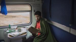 A passenger sits reading a book in his cabin while travelling the Green Line train service from Karachi to Islamabad.(Asim Hafeez/Bloomberg) A passenger sits reading a book in his cabin while travelling the Green Line train service from Karachi to Islamabad.(Asim Hafeez/Bloomberg)