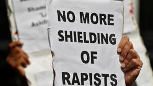 People hold placards at a protest against the rape of an eight-year-old girl, in Kathua, near Jammu and a teenager in Unnao, Uttar Pradesh state, in New Delhi, on Thursday.(Reuters photo) People hold placards at a protest against the rape of an eight-year-old girl, in Kathua, near Jammu and a teenager in Unnao, Uttar Pradesh state, in New Delhi, on Thursday.(Reuters photo)