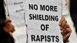 People hold placards at a protest against the rape of an eight-year-old girl, in Kathua, near Jammu and a teenager in Unnao, Uttar Pradesh, in New Delhi.(Reuters Photo) People hold placards at a protest against the rape of an eight-year-old girl, in Kathua, near Jammu and a teenager in Unnao, Uttar Pradesh, in New Delhi.(Reuters Photo)