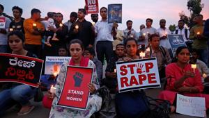 People participate in a candle light vigil as they protest against the rape of an eight-year-old girl in Kathua near Jammu, and a teenager in Unnao, Uttar Pradesh, in Bengaluru, India, February 15, 2018.(REUTERS) People participate in a candle light vigil as they protest against the rape of an eight-year-old girl in Kathua near Jammu, and a teenager in Unnao, Uttar Pradesh, in Bengaluru, India, February 15, 2018.(REUTERS)