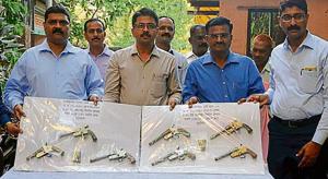 The seven country-made pistols and six live bullets that were seized from the accused.(HT photo)