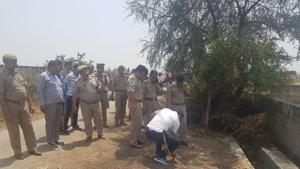 Police at the encounter site in Noida on Saturday.(HT Photo) Police at the encounter site in Noida on Saturday.(HT Photo)
