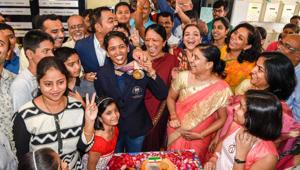 Family members and neighbours of shooter Tejaswini Sawant welcome her at her residence in Kothrud.(SANKET WANKHADE/HT PHOTO) Family members and neighbours of shooter Tejaswini Sawant welcome her at her residence in Kothrud.(SANKET WANKHADE/HT PHOTO)