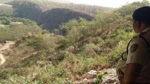 On Saturday, residents spotted three people hacking more than 30 trees within the forest area.(HT Photo) On Saturday, residents spotted three people hacking more than 30 trees within the forest area.(HT Photo)