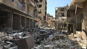 Rubble fills a street in Douma, the site of a suspected chemical weapons attack, near Damascus, Syria, Monday, April 16, 2018. The international team has been in the country since Saturday, but has not been allowed to visit Douma, the BBC reported.(AP) Rubble fills a street in Douma, the site of a suspected chemical weapons attack, near Damascus, Syria, Monday, April 16, 2018. The international team has been in the country since Saturday, but has not been allowed to visit Douma, the BBC reported.(AP)