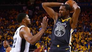Golden State Warriors forward Kevin Durant (35) controls the ball against San Antonio Spurs forward Rudy Gay (22).(USA TODAY Sports) Golden State Warriors forward Kevin Durant (35) controls the ball against San Antonio Spurs forward Rudy Gay (22).(USA TODAY Sports)