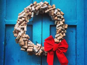 A wreath made from wine corks attached to the door makes for a cute entrance.(Istock) A wreath made from wine corks attached to the door makes for a cute entrance.(Istock)