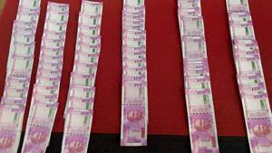 BSF seized fake currency notes of Rs. 2000 denomination with a face value of Rs 4.4 lakh from international boundary under Dhubri district of Assam last year.(PTI FILE PHOTO)