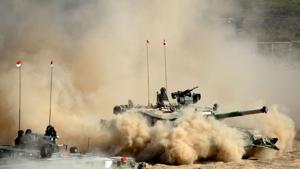Arjun Mark II tanks drive through sand during a display at the DefExpo 2018 on the outskirts of Chennai on April 11, 2018.(AFP Photo) Arjun Mark II tanks drive through sand during a display at the DefExpo 2018 on the outskirts of Chennai on April 11, 2018.(AFP Photo)