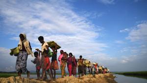 In this file photo taken on November 2, 2017, Rohingya Muslim refugees who were stranded after leaving Myanmar walk towards the Balukhali refugee camp after crossing the border in Bangladesh's Ukhia district.(AFP File Photo) In this file photo taken on November 2, 2017, Rohingya Muslim refugees who were stranded after leaving Myanmar walk towards the Balukhali refugee camp after crossing the border in Bangladesh's Ukhia district.(AFP File Photo)