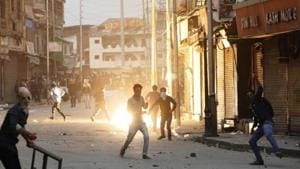 Kashmiri students throw stones towards policemen during a protest in Srinagar.(AP File Photo) Kashmiri students throw stones towards policemen during a protest in Srinagar.(AP File Photo)