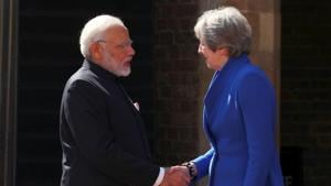 Prime Minister Narendra Modi greets Britain's Prime Minister Theresa May ahead of a working session at the Commonwealth Heads of Government Meeting in London on April 19, 2018.(Reuters) Prime Minister Narendra Modi greets Britain's Prime Minister Theresa May ahead of a working session at the Commonwealth Heads of Government Meeting in London on April 19, 2018.(Reuters)