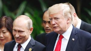 US President Donald Trump and Russia's President Vladimir Putin talk during the group photo session at the APEC Summit in Danang, Vietnam. The White House has confirmed that US President Donald Trump invited Russia's Vladimir Putin to Washington.(AP File Photo) US President Donald Trump and Russia's President Vladimir Putin talk during the group photo session at the APEC Summit in Danang, Vietnam. The White House has confirmed that US President Donald Trump invited Russia's Vladimir Putin to Washington.(AP File Photo)