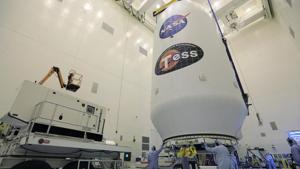 In this file photo taken on April 11, 2018 obtained from NASA, technicians assist as the SpaceX payload fairing containing the NASA’s Transiting Exoplanet Survey Satellite (TESS) is moved by crane to a transporter inside the Payload Hazardous Servicing Facility at NASA’s Kennedy Space Center, Florida.(AFP) In this file photo taken on April 11, 2018 obtained from NASA, technicians assist as the SpaceX payload fairing containing the NASA’s Transiting Exoplanet Survey Satellite (TESS) is moved by crane to a transporter inside the Payload Hazardous Servicing Facility at NASA’s Kennedy Space Center, Florida.(AFP)