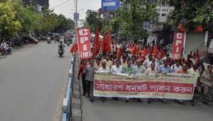 File photo of CPI(M) supporters protesting in Siliguri on April 13, against violence allegedly by activists of the ruling Trinamool Congress.(AFP)