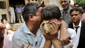 Relatives of the convicts in 2002 Naroda Patiya massacre case in tears outside the court after the pronouncement of sentence in Ahmedabad, in 2012.(AP File Photo) Relatives of the convicts in 2002 Naroda Patiya massacre case in tears outside the court after the pronouncement of sentence in Ahmedabad, in 2012.(AP File Photo)