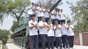 The newly admitted girls of UP Sainik School in Lucknow pose before a Vijayanta tank in he school premises on Friday.(Deepak Gupta/HT) The newly admitted girls of UP Sainik School in Lucknow pose before a Vijayanta tank in he school premises on Friday.(Deepak Gupta/HT)