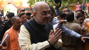 BJP president Amit Shah along with Uttar Pradesh chief minister Yogi Adityanath at the party office in Lucknow.(Subhankar Chakraborty/HT Photo)