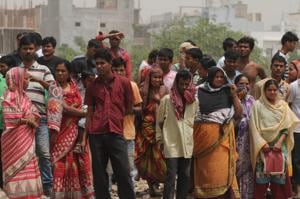 Residents who lost their huts and belongings to the fire have been sheltered in a government primary school.(Parveen Kumar/HT PHOTO) Residents who lost their huts and belongings to the fire have been sheltered in a government primary school.(Parveen Kumar/HT PHOTO)