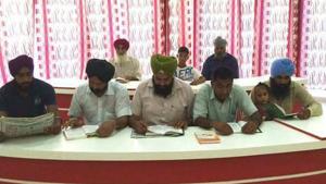 Visitors at the air-conditioned library at Chananwal village in Barnala.(HT Photo) Visitors at the air-conditioned library at Chananwal village in Barnala.(HT Photo)