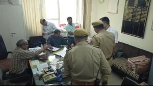 Kota police officials probe at the income tax department office in Kota.(HT PHOTO)