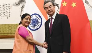 Foreign minister Sushma Swaraj, left, poses with her Chinese counterpart Wang Yi prior to a meeting at the Diaoyutai State Guesthouse in Beijing on April 22, 2018.(AP) Foreign minister Sushma Swaraj, left, poses with her Chinese counterpart Wang Yi prior to a meeting at the Diaoyutai State Guesthouse in Beijing on April 22, 2018.(AP)